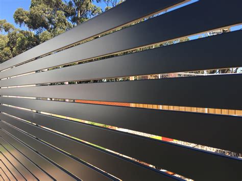 Aluminium Slat Fencing & Gates .